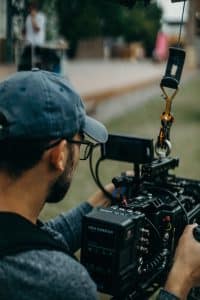 Cameraman films a location scene