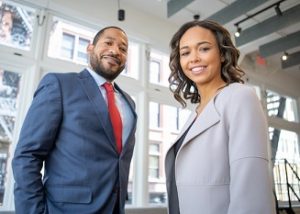 Businessman and woman of Millennial age