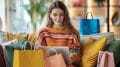 Woman surrounded by gift boxes